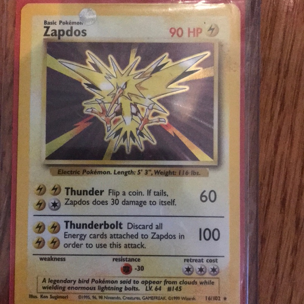 Two old rare Pokémon cards.